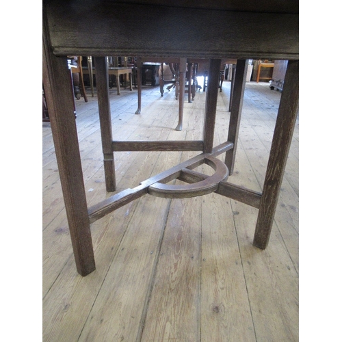 41 - An Arts and Crafts style gate leg table, width 44ins