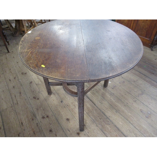 41 - An Arts and Crafts style gate leg table, width 44ins