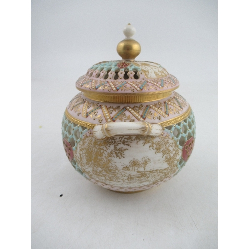 412 - A Royal Worcester reticulated sugar bowl and cover by Henry Bright, with small vignette landscape pa... 