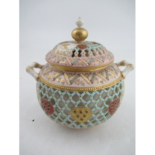 412 - A Royal Worcester reticulated sugar bowl and cover by Henry Bright, with small vignette landscape pa... 