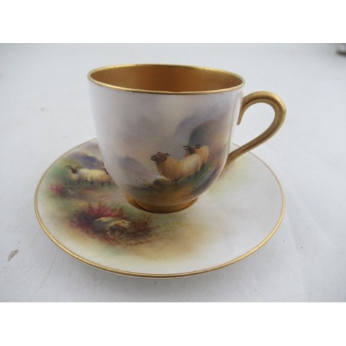 416 - A Royal Worcester coffee cup and saucer decorated with cattle by H Stinton together with a coffee cu... 