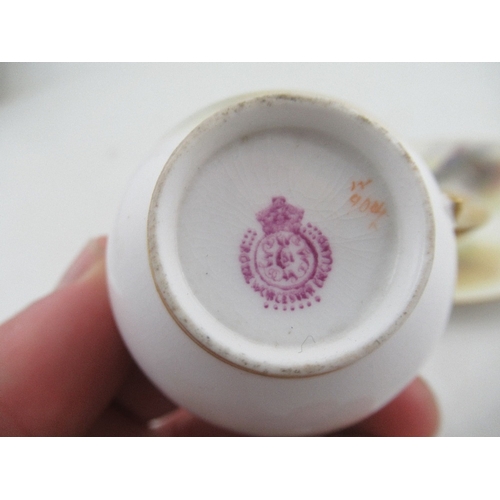 416 - A Royal Worcester coffee cup and saucer decorated with cattle by H Stinton together with a coffee cu... 