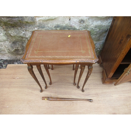 42 - An oak bedside cabinet, width 17ins, together with a nest of tables