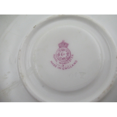 430 - A Royal Worcester tea cup and saucer decorated with fruit by Austin and Price together with a miniat... 