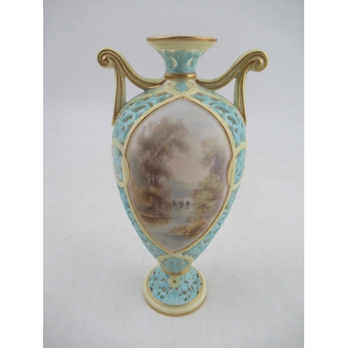 443 - A Grainger's  Worcester turquoise pierced vase with reserved landscape panels, height 7.5ins