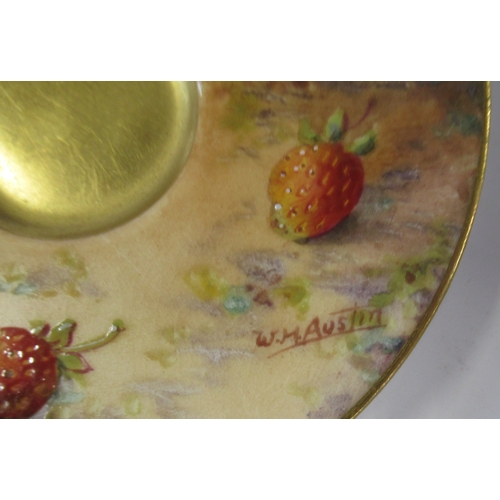 457 - A Royal Worcester cabinet cup and saucer, decorated with fruit to a mossy background, the cup by E P... 