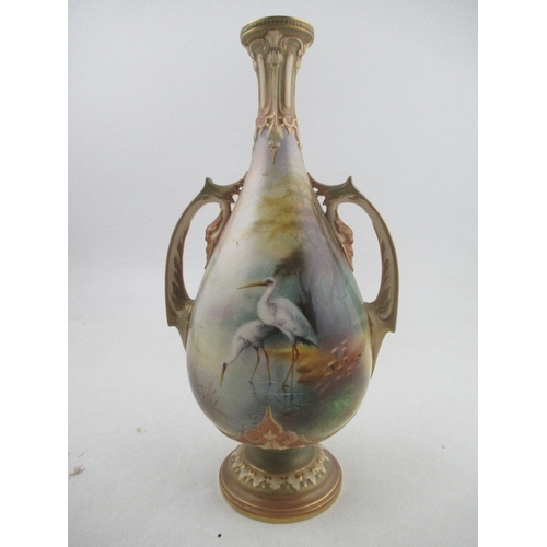 462 - A Royal Worcester vase, the front decorated with two storks wading by Lewis and a landscape to the r... 