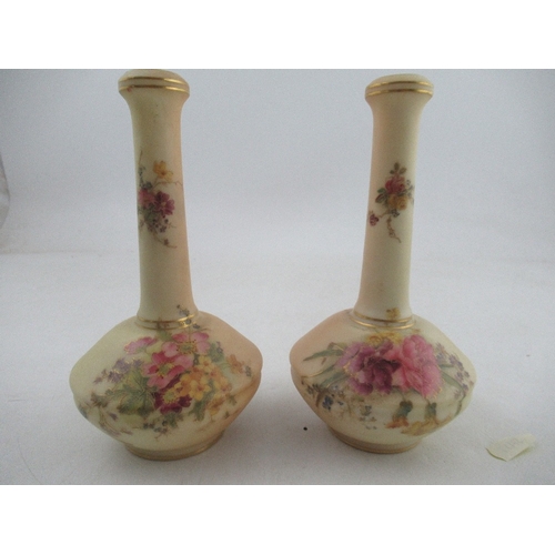 465 - A pair of Royal Worcester blush ivory vases, decorated with flowers, shape number 1531, height 7ins