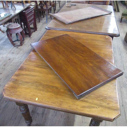 53 - Two 19th century mahogany extending dining tables, each table has an extra leaf and handle, total le... 