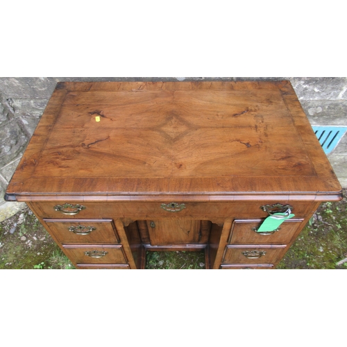 56 - An 18th century walnut kneehole desk, width 34ins, depth 20ins, height 32ins