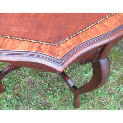 57 - An Edwardian centre table, with inlaid decoration, width 30ins