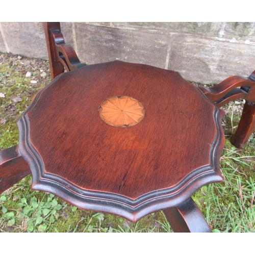 57 - An Edwardian centre table, with inlaid decoration, width 30ins