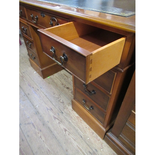 59 - A reproduction twin pedestal desk, width 48ins, depth 24ins, height 30ins