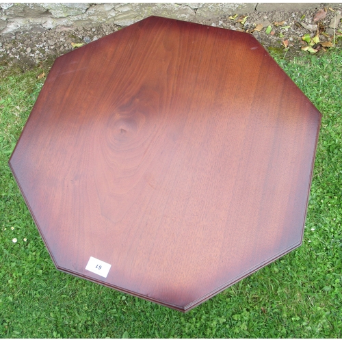 61 - A folding mahogany table, width 22ins