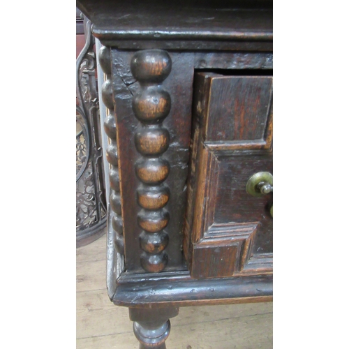 68 - An Antique oak dresser, with boarded plate rack over, the base having moulded drawer fronts, width 7... 