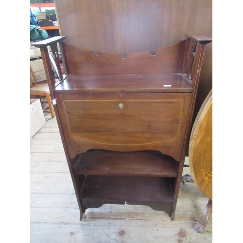 70 - An Edwardian narrow bureau, with cross banded decoration, the drop flap revealing drawers and pigeon... 