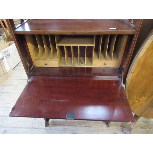 70 - An Edwardian narrow bureau, with cross banded decoration, the drop flap revealing drawers and pigeon... 