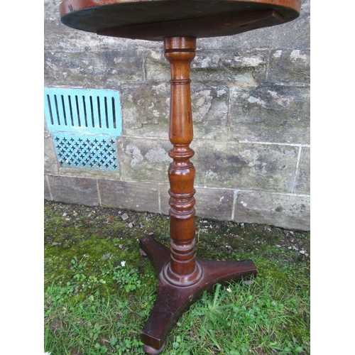 78 - An mahogany circular occasional table, raised on turned column terminating in triform base, diameter... 