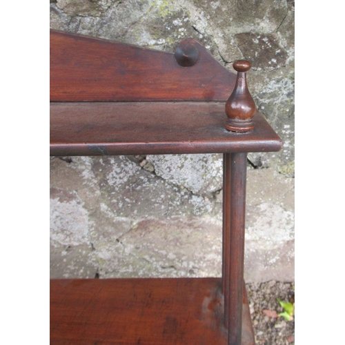 81 - A 19th century mahogany set of open shelves, width