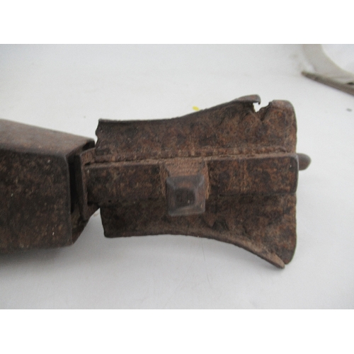 217 - An Antique metal lock, height 15ins