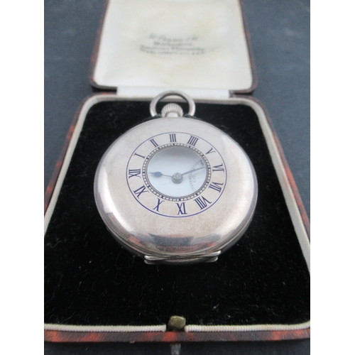 306a - A J.W.Benson silver half hunter pocket watch, London 1939, with blue enamel chapter ring, Roman nume... 