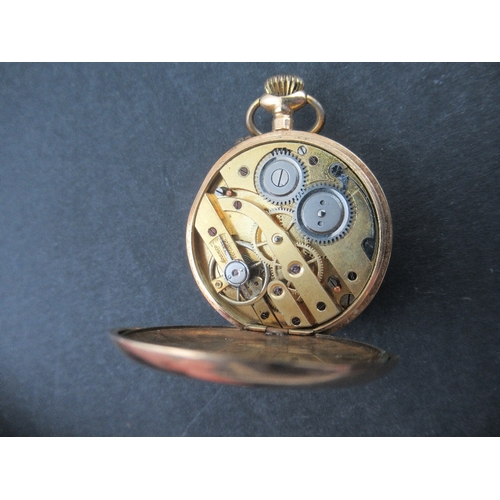 311a - A 14K yellow gold fob watch , stamped '8442', engraved , monogram to reverse, weight 24g