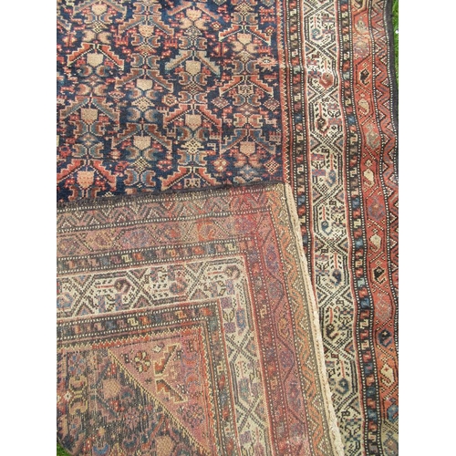 91 - An Eastern design rug,  84ins x 48ins