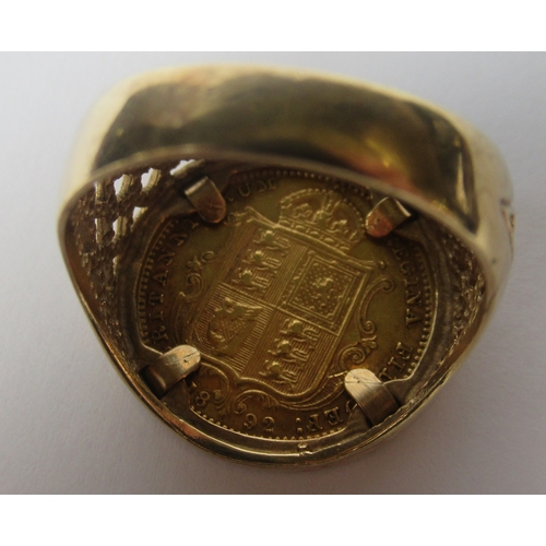 321a - A 9ct ring set with a Victorian shield back half sovereign, dated 1892, with pierced shoulders, weig... 