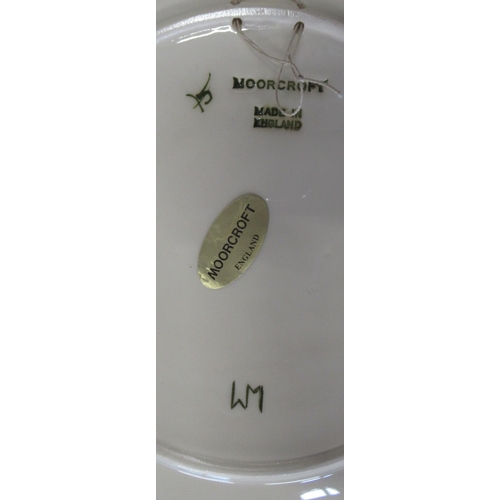 118 - Two Moorcroft plates, one in Lemons pattern and the other in Wattle, diameter 10.5ins