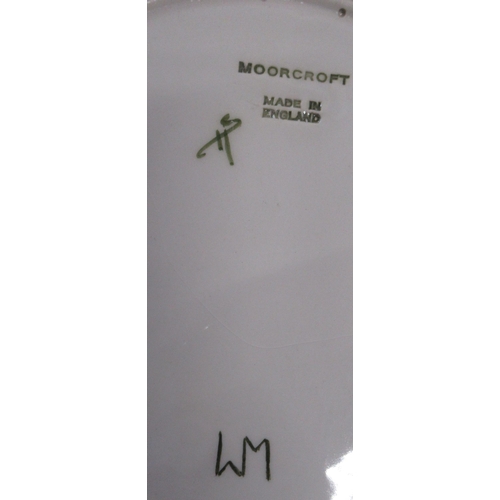 118 - Two Moorcroft plates, one in Lemons pattern and the other in Wattle, diameter 10.5ins