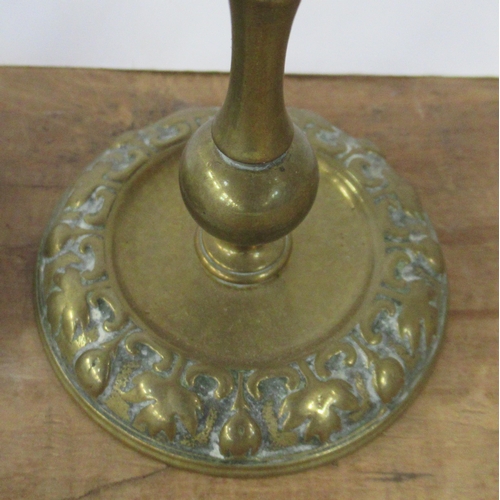 119 - A pair of brass candlesticks, height 5ins