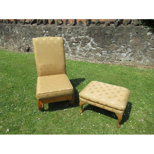12 - An Art Deco style easy chair and a foot stool, upholstered in the same fabric