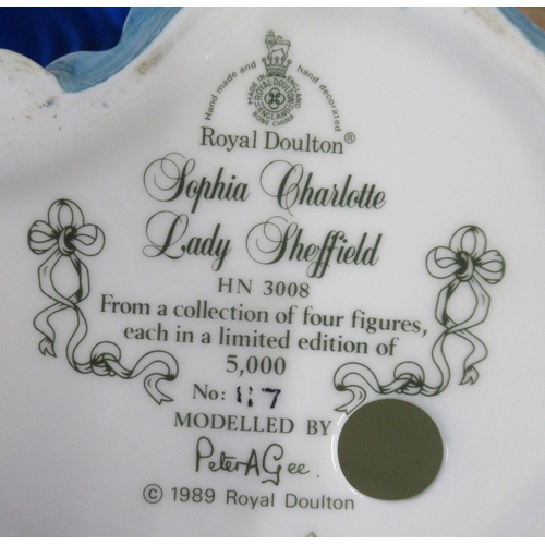 137 - Two boxed Royal Doulton figures