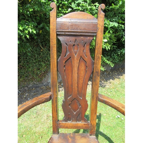 14 - An Arts and Crafts style open arm chair