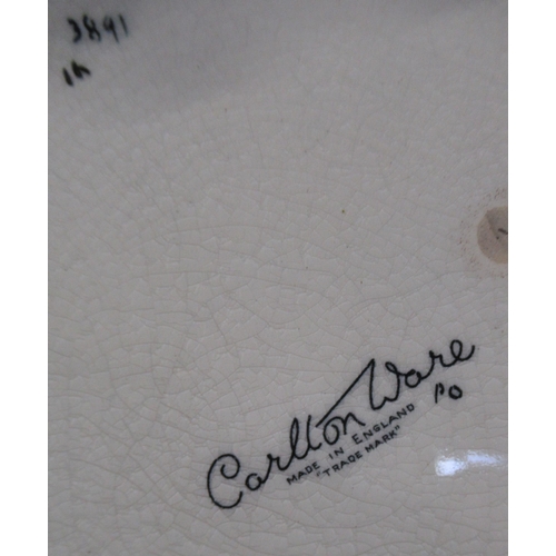 140 - A Carlton Ware dish, plate and a vase, all decorated in the Sketching Bird pattern