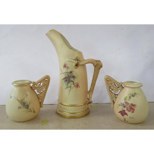 144 - Two Royal Worcester blush ivory vases, with pierced handle, shape number 1137, together with a Royal... 