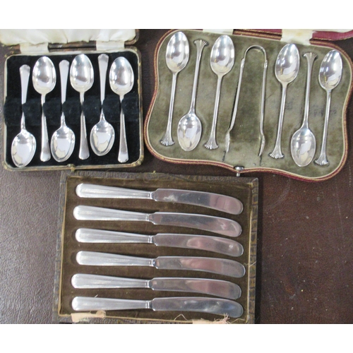 151 - A cased set of six silver tea spoons, with matching sugar tongs, together with another cased set of ... 