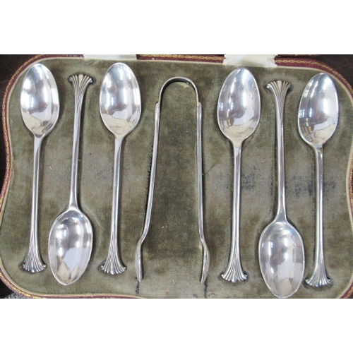 151 - A cased set of six silver tea spoons, with matching sugar tongs, together with another cased set of ... 