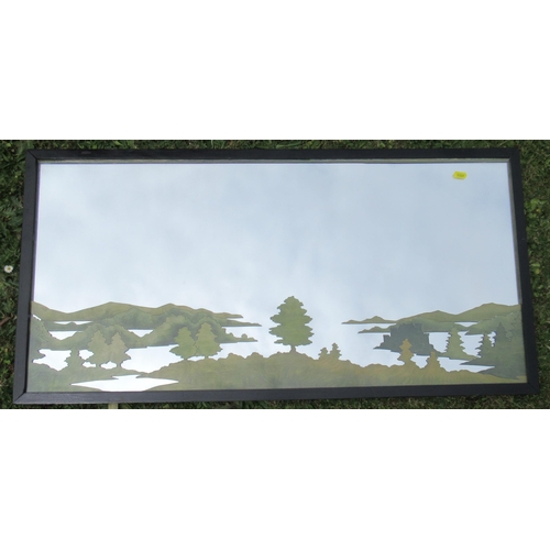 181 - A rectangular wall mirror, with green forest decoration, 17ins x 36ins