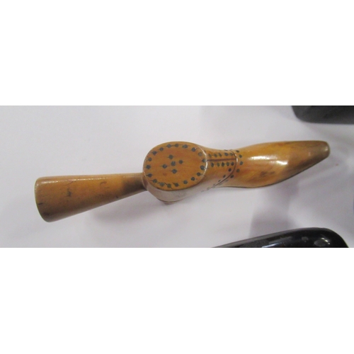 215 - A faux tortoiseshell cigarette case, together with a treen shoe, a counter box and a snuff box