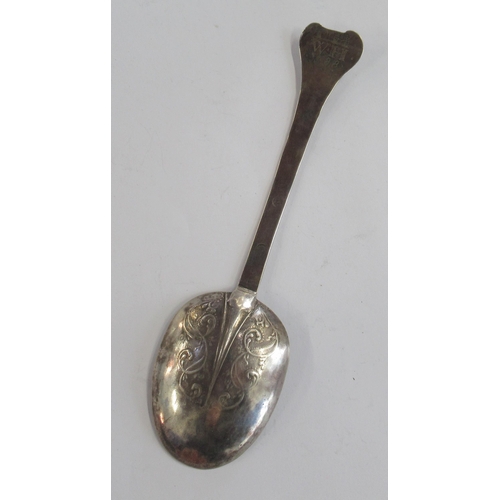217 - An Antique silver spoon, with embossed decoration, initialled and dated 1688, length 7.25ins