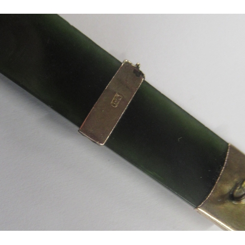 219 - A Victorian hardstone brooch, with 9ct gold mounts