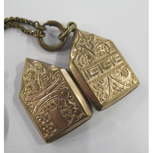 224 - A yellow metal locket, chain and propelling pencil