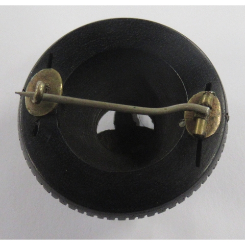 226 - A Victorian jet mourning brooch, of circular form