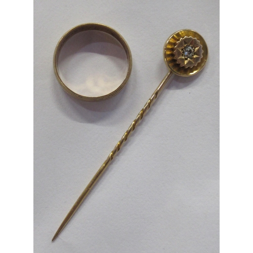 235 - A 9ct gold wedding band, weight 3.1g, together with a stone set stick pin