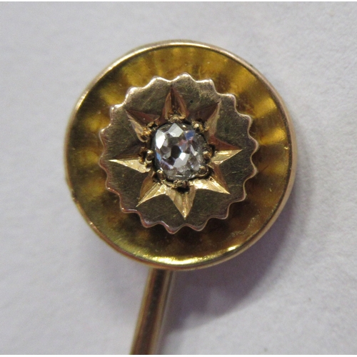 235 - A 9ct gold wedding band, weight 3.1g, together with a stone set stick pin