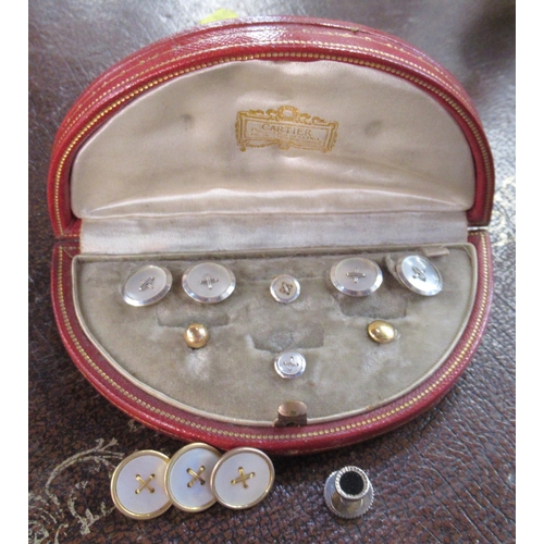 236 - A Cartier gents dress button set, with mother of pearl and 18ct gold, together with three other butt... 