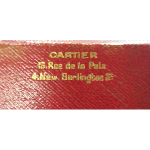 236 - A Cartier gents dress button set, with mother of pearl and 18ct gold, together with three other butt... 