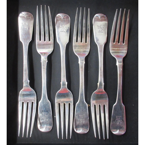 238 - A set of six Georgian Irish silver fiddle pattern dinner forks, engraved with a crest, weight 14oz