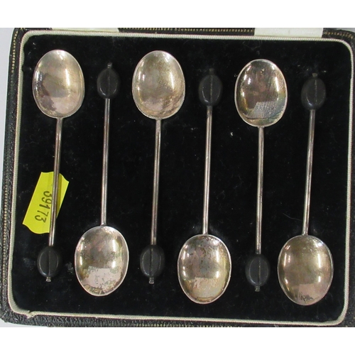 240 - A collection of silver cruets, funnels, coffee bean spoons etc